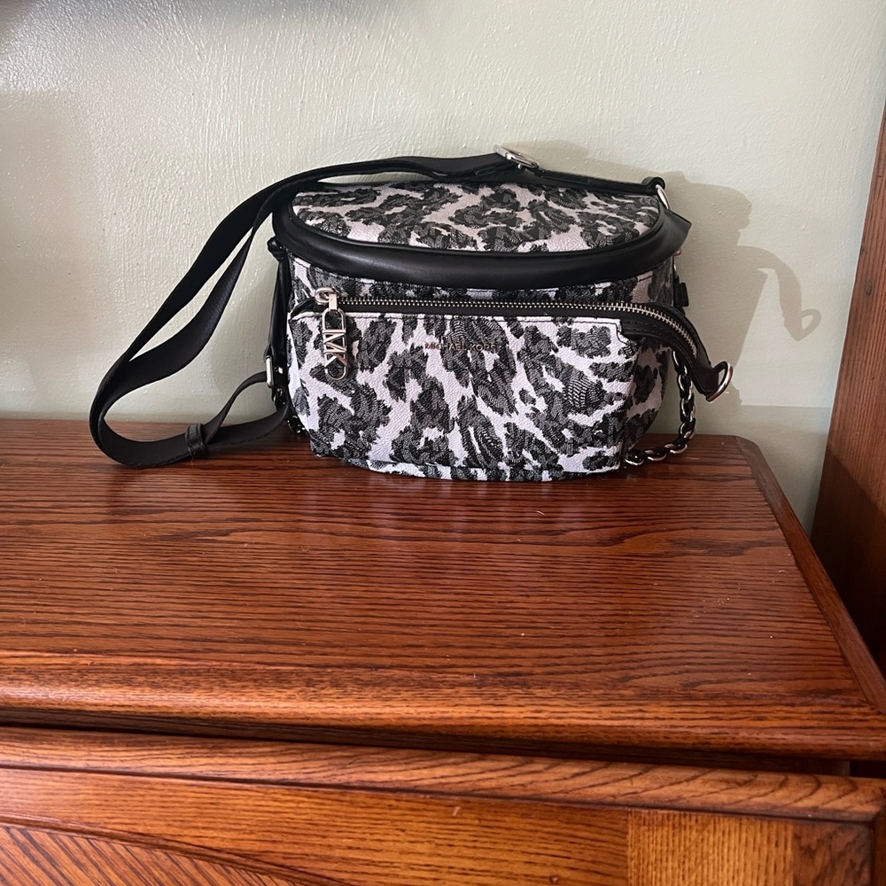 Michael Kors slater leopard print calf half sling.